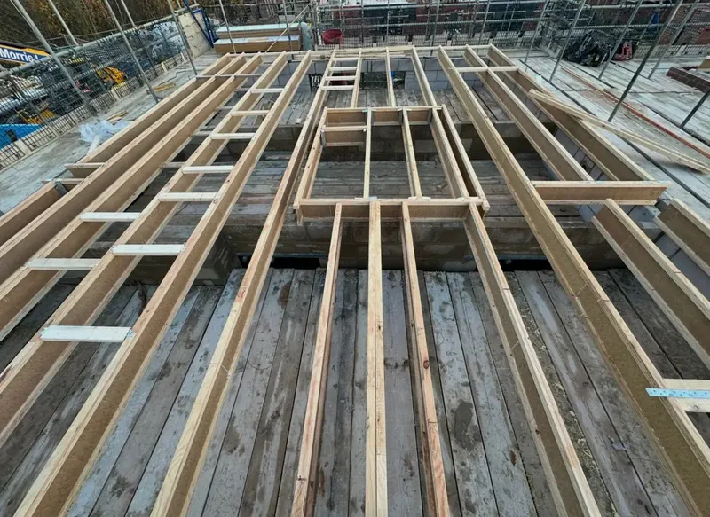 Floor joist installation on new build site