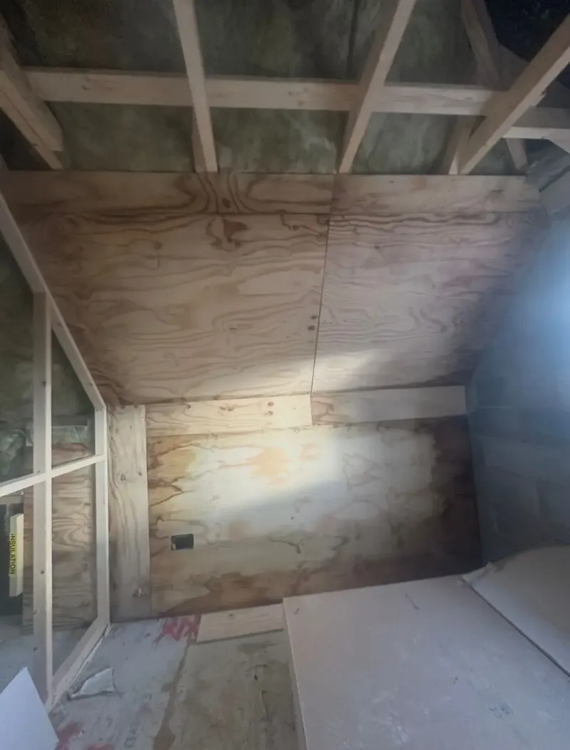 Loft boarding and stud wall construction