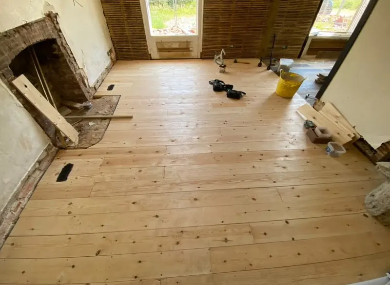 Pine floorboard installation