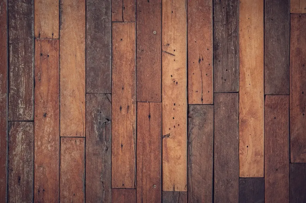 Hardwood and pine floorboard installation